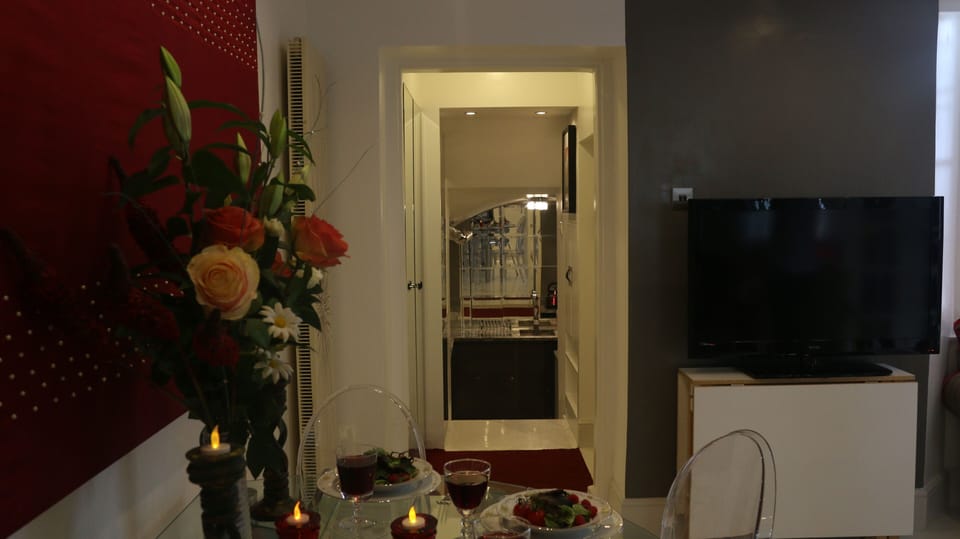 corridor leading to very cute and practical  kitchen