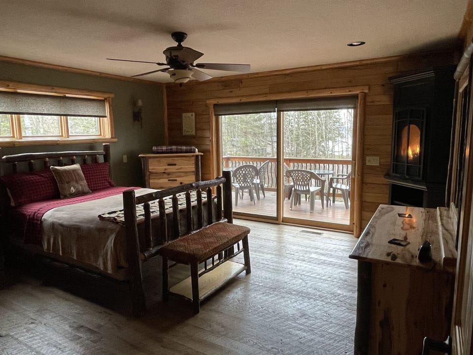 Master suite --queen bedroom and private bath.  Sliding glass doors to deck.
