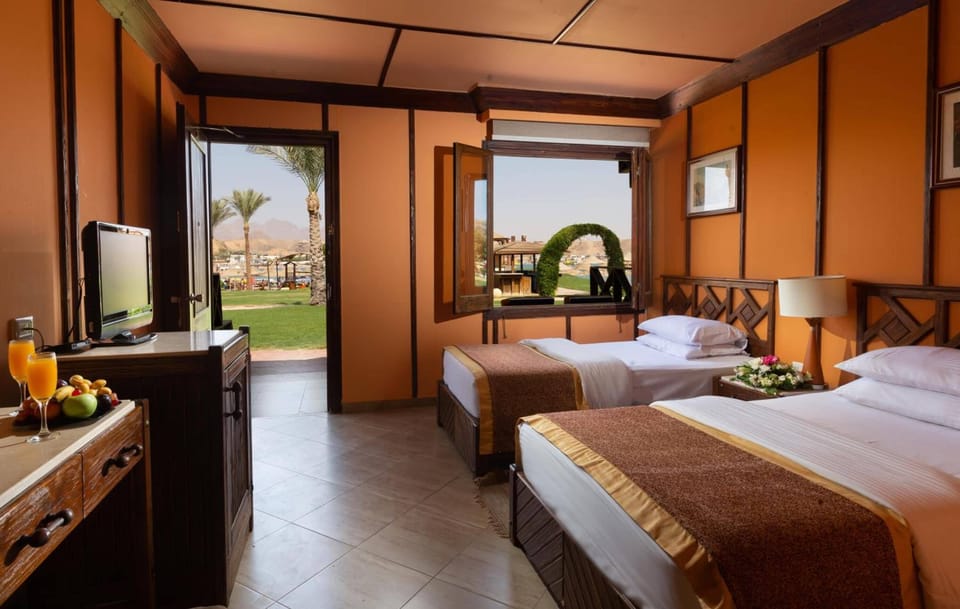 Superior Bungalow, Sea View | Free minibar, in-room safe, blackout drapes, iron/ironing board