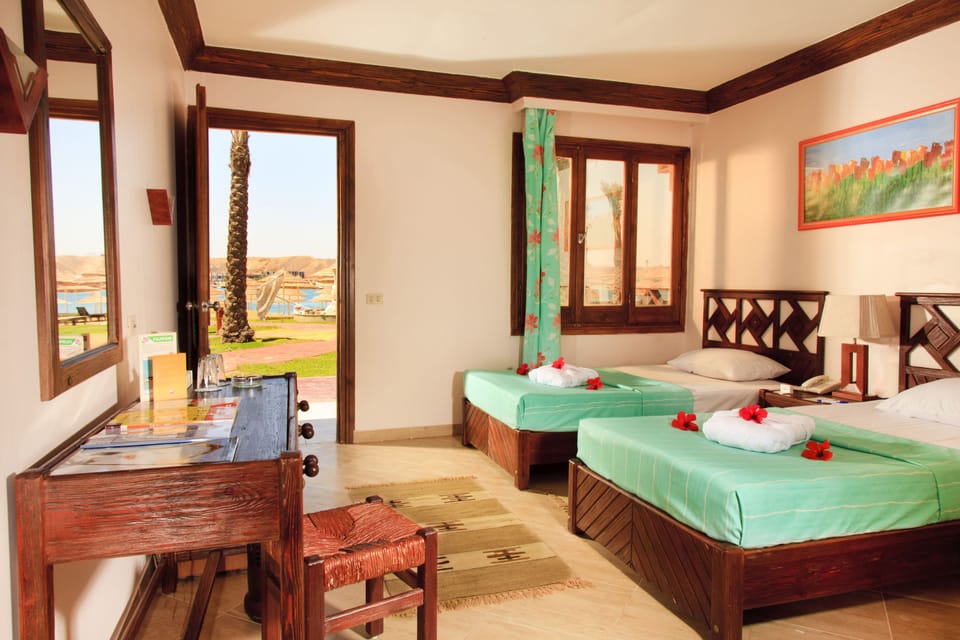 Superior Bungalow, Sea View | Free minibar, in-room safe, blackout drapes, iron/ironing board