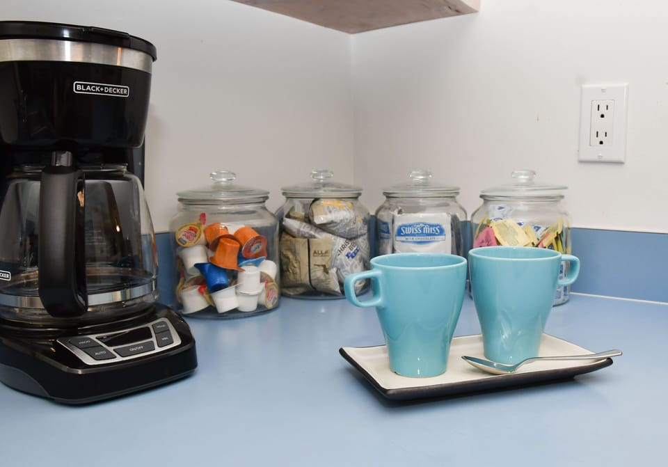 We provide a full coffee bar with filters, coffee, sweeteners and creamers.