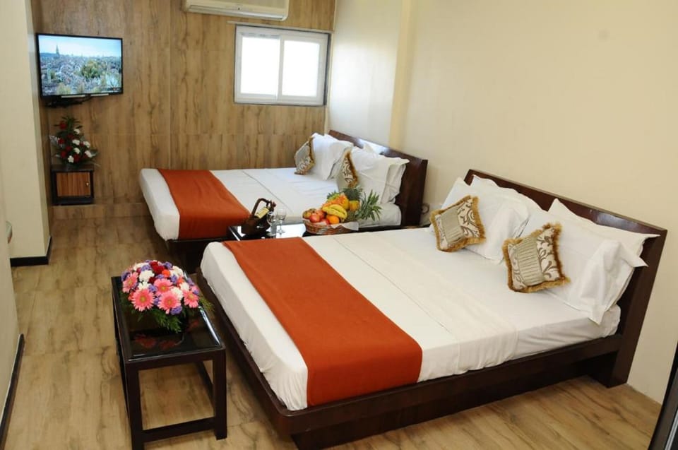 Family Room, 2 Queen Beds, Non Smoking | Premium bedding, iron/ironing board, rollaway beds, free WiFi