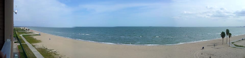 Unobstructed view(no trees)from the condo balcony. Drop something & hit the sand
