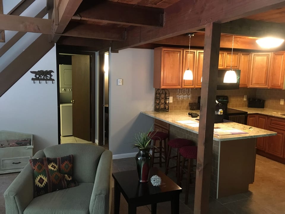 Granite kitchen with upgraded solid wood cabinets.