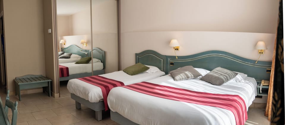 Triple Room | In-room safe, desk, soundproofing, free cribs/infant beds