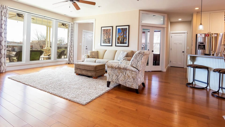 Open floor plan, endless possibilities! Make yourself at home in the inviting living room at Midnight’s Manor.
