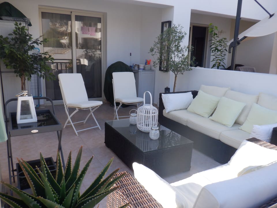 Plenty of outside seating - balcony over looks the two pools