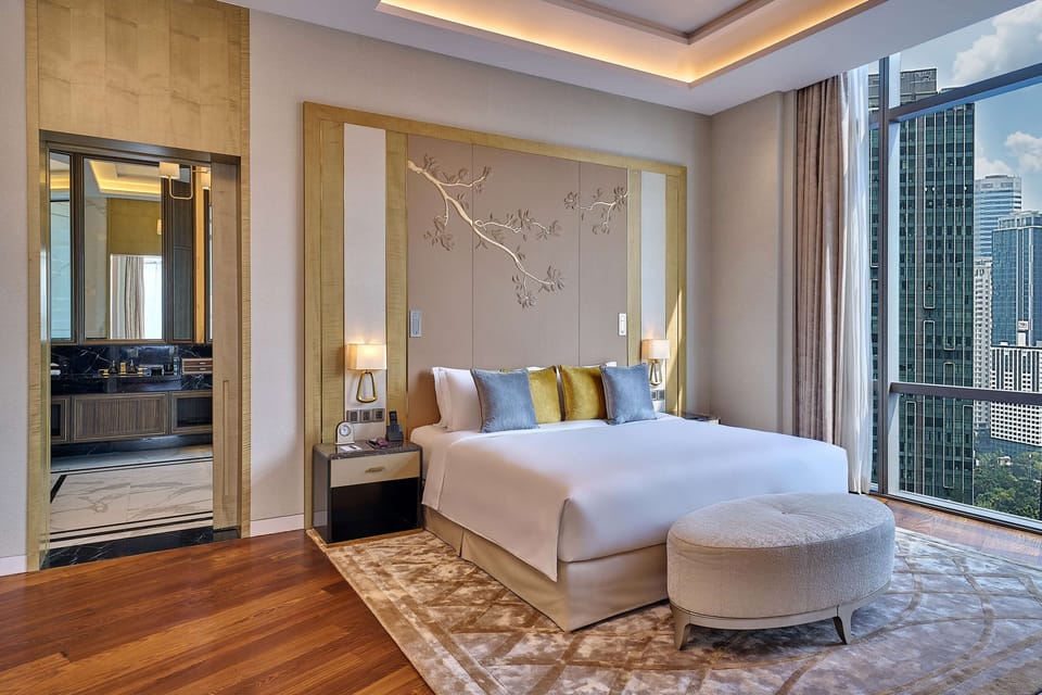 Premium bedding, down comforters, minibar, in-room safe