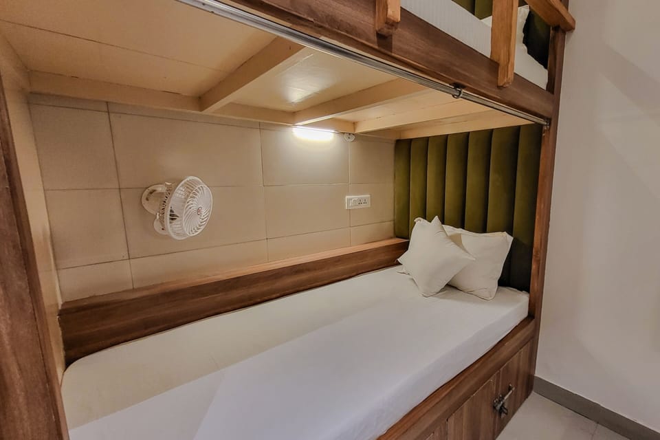 Bed in 6 Bed Premium Mixed AC Dorm | Premium bedding, blackout drapes, free WiFi, bed sheets