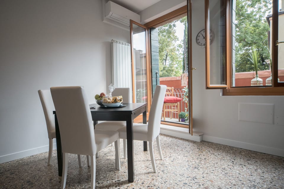 Apartment, 1 Bedroom | Living room | Flat-screen TV