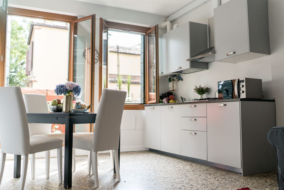 Apartment, 1 Bedroom | Living room | Flat-screen TV