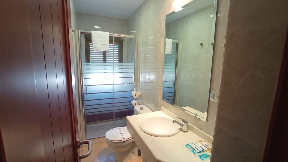 Triple Room, 3 Twin Beds, Balcony | Bathroom | Free toiletries, hair dryer, towels