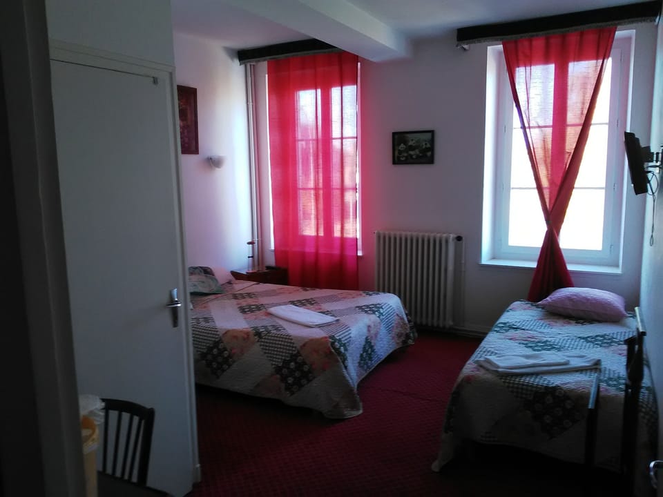 Triple Room | Individually decorated, individually furnished, blackout drapes