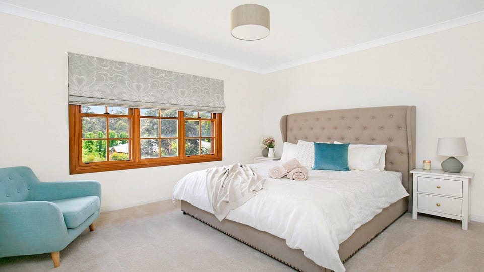Ballogie Lodge | Bedroom 1 | King bed | Ducted reverse cycle air-conditioning | Stand-alone heater