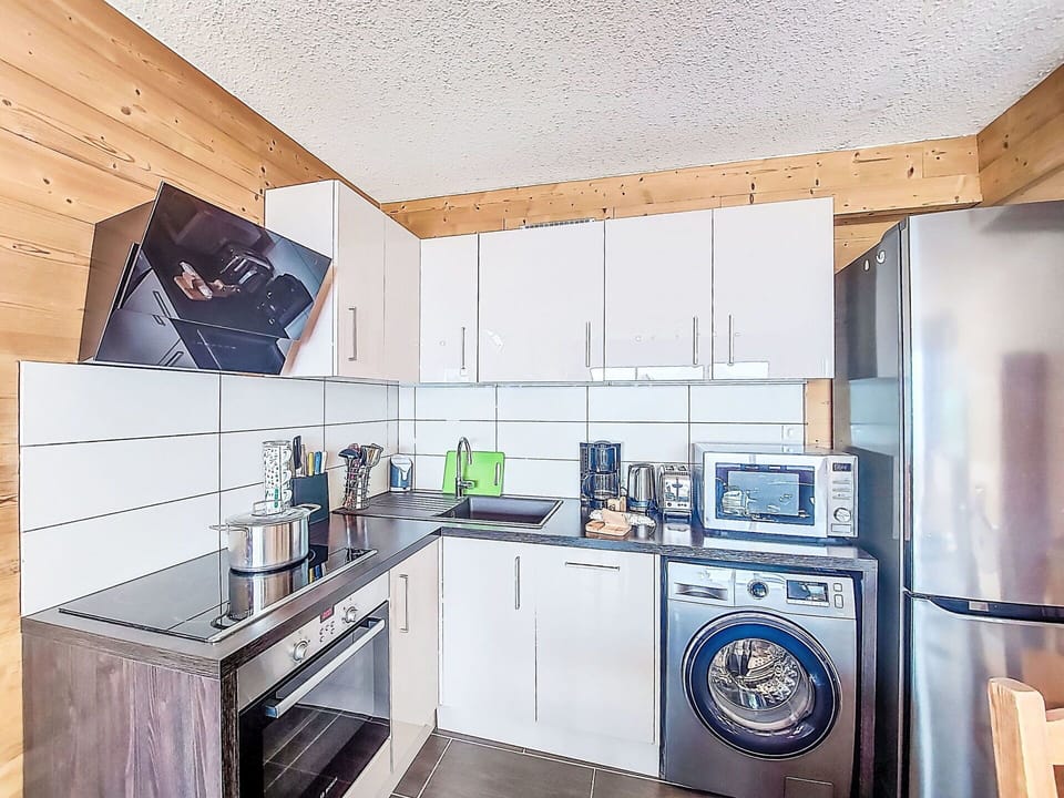 Interior Design, Flooring, Wood, Floor, Ceiling, Room, Furniture, Major Appliance, Lighting, Wood Flooring