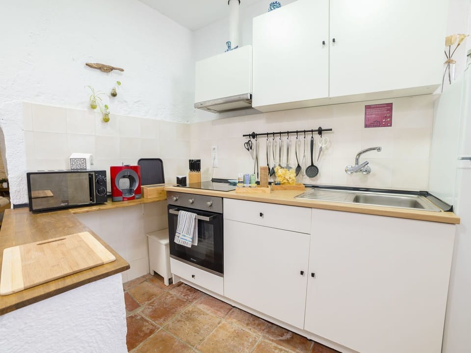 Property, Room, Kitchen, Furniture, Yellow, Cabinetry, Interior Design, Countertop, Building, House