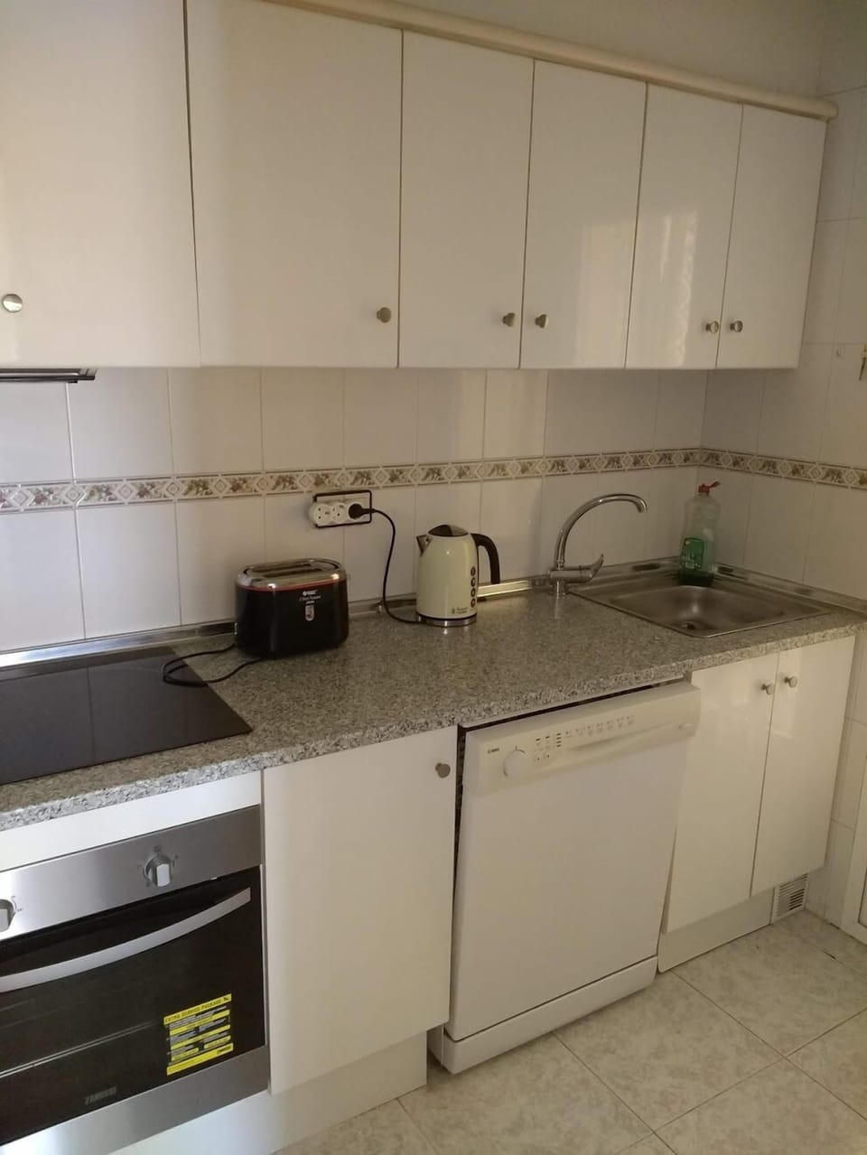 Separate kitchen.kettle.toaster .coffee maker and that all important dishwasher