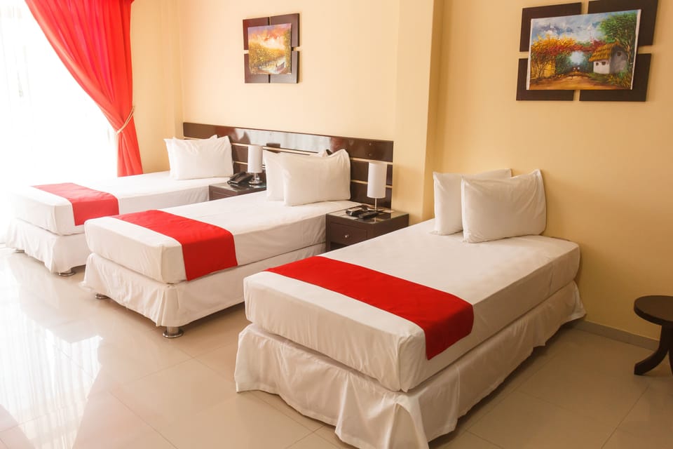 Standard Triple Room | Down comforters, minibar, in-room safe, desk