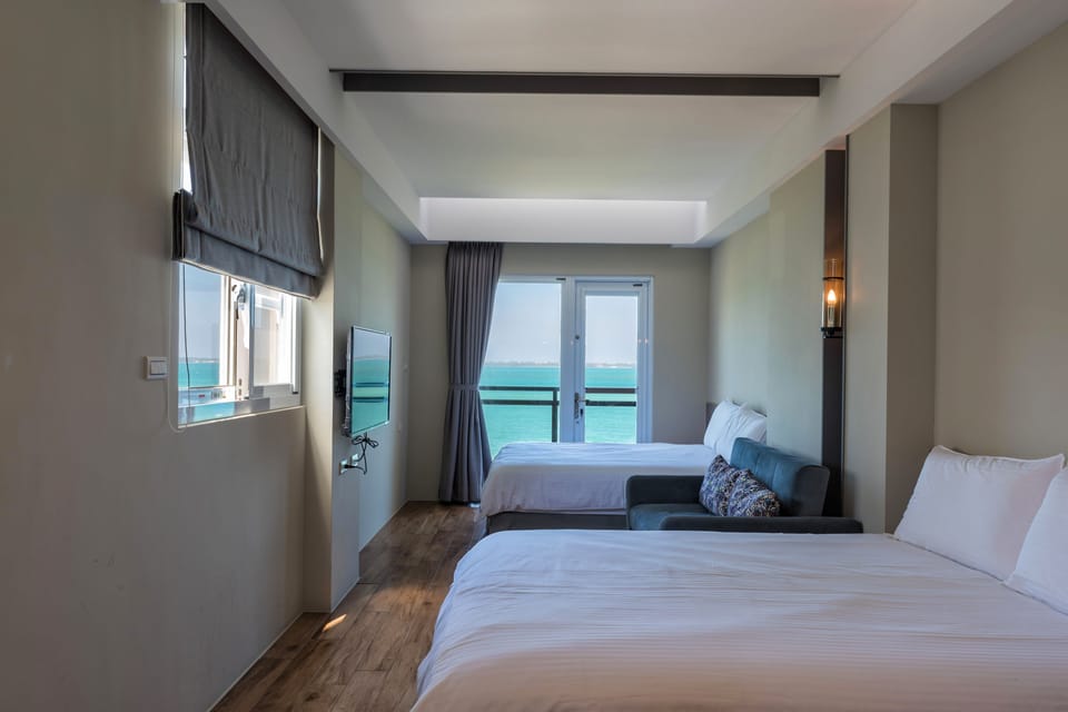 Panoramic Quadruple Room, 2 Double Beds, Non Smoking, Ocean View | Desk, blackout drapes, soundproofing, rollaway beds