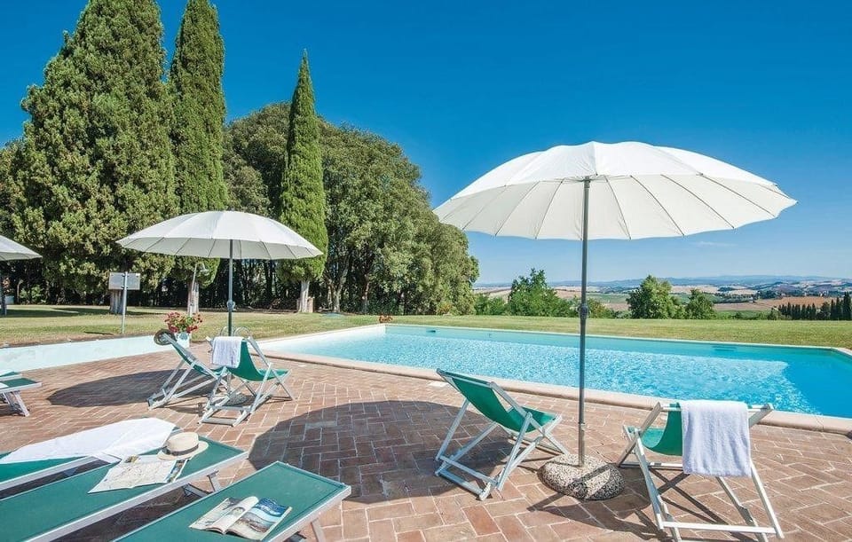 Seasonal outdoor pool, pool umbrellas, sun loungers