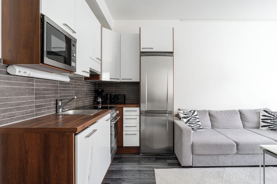 Comfort Apartment, 1 Bedroom, City View | Living area | 40-inch flat-screen TV with cable channels, Smart TV
