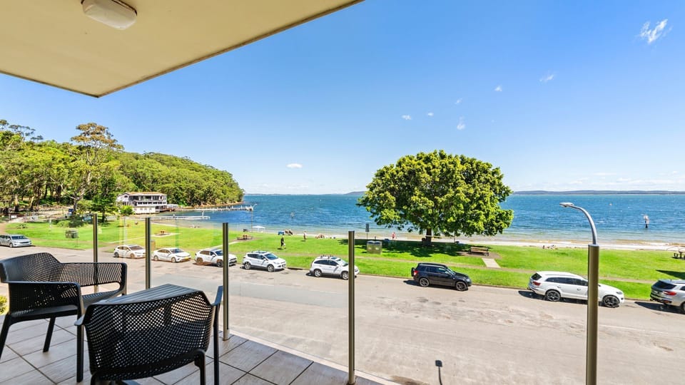 Sit on your balcony and watch the boats go by!