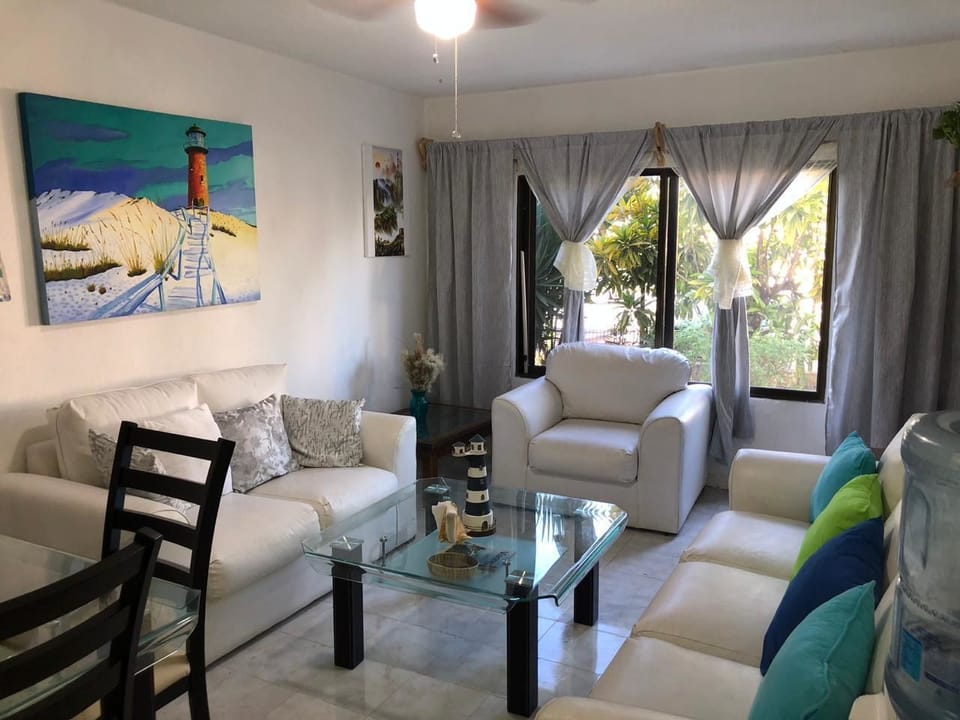 Deluxe House | Living room | Flat-screen TV
