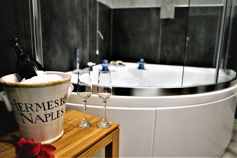 Luxury Room, Multiple Beds, Hot Tub, City View | Bathroom | Free toiletries, hair dryer, slippers, bidet