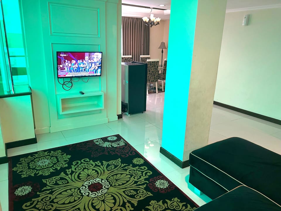 Studio Suite | Living area | 32-inch LED TV with digital channels