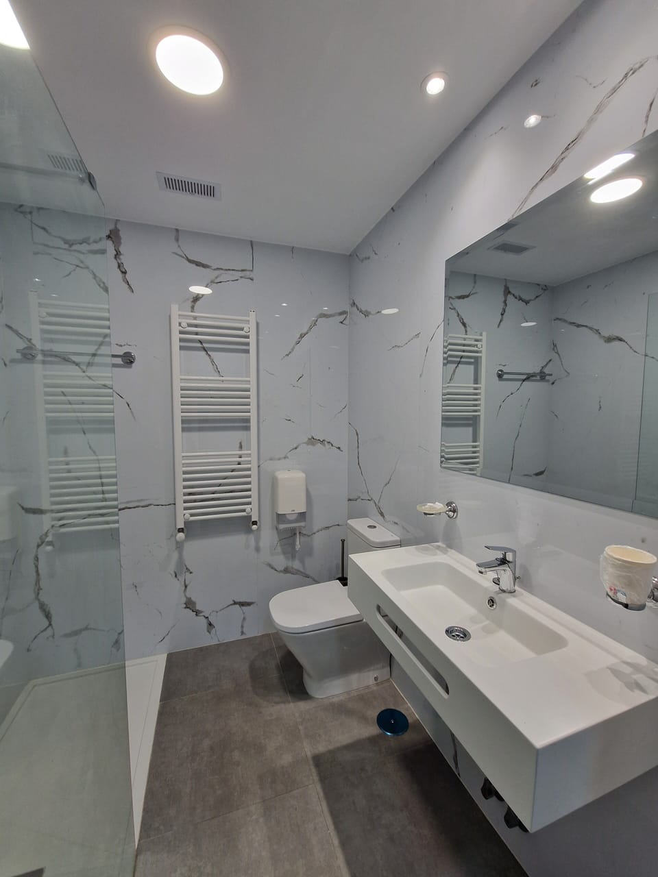 Comfort Room | Bathroom | Hair dryer, towels, soap, shampoo