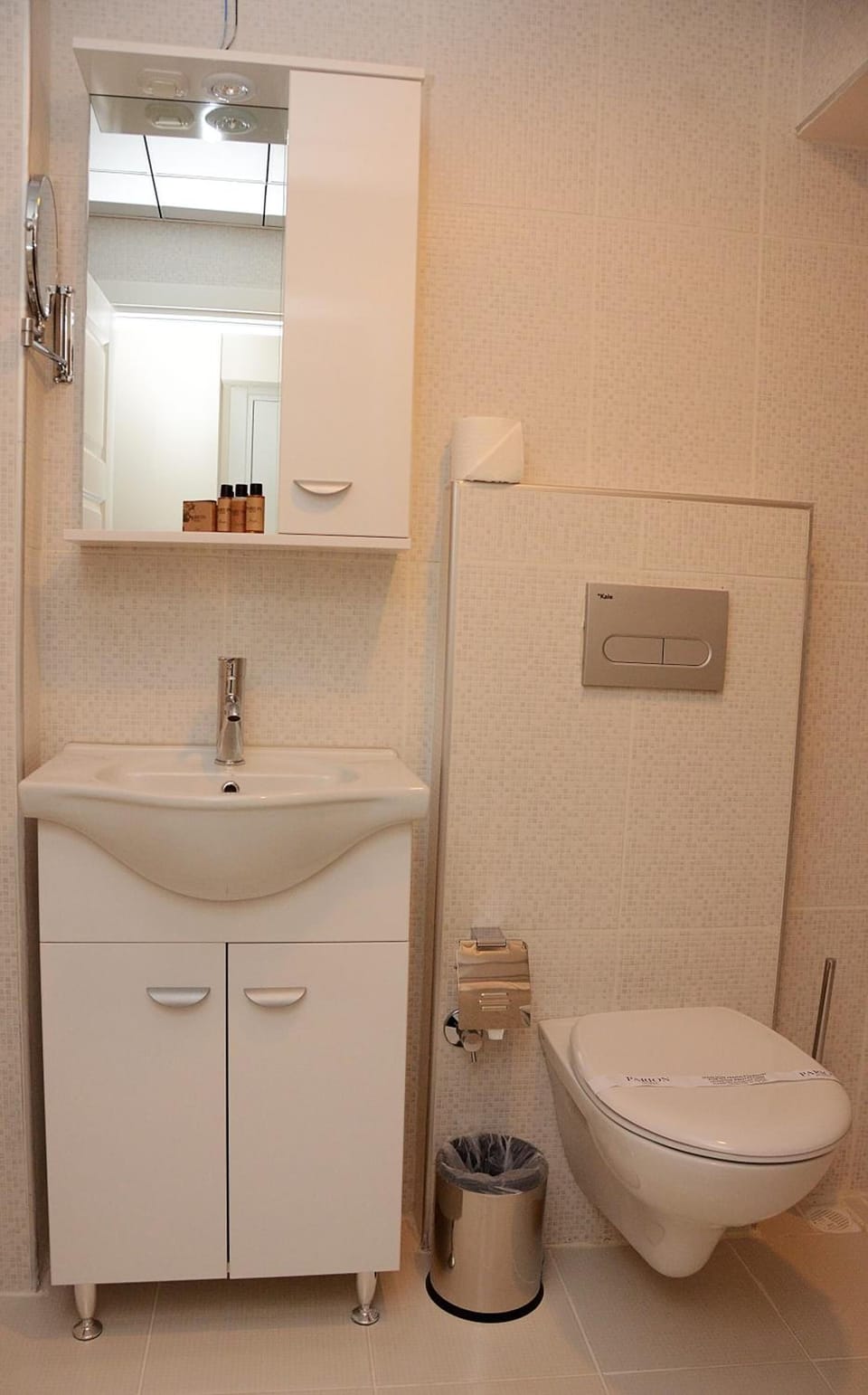 Shower, hair dryer, slippers, towels