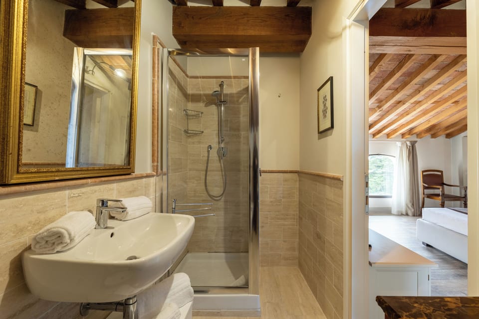 Junior Suite, 2 Bedrooms, 2 Bathrooms | Bathroom | Shower, hair dryer, slippers, bidet