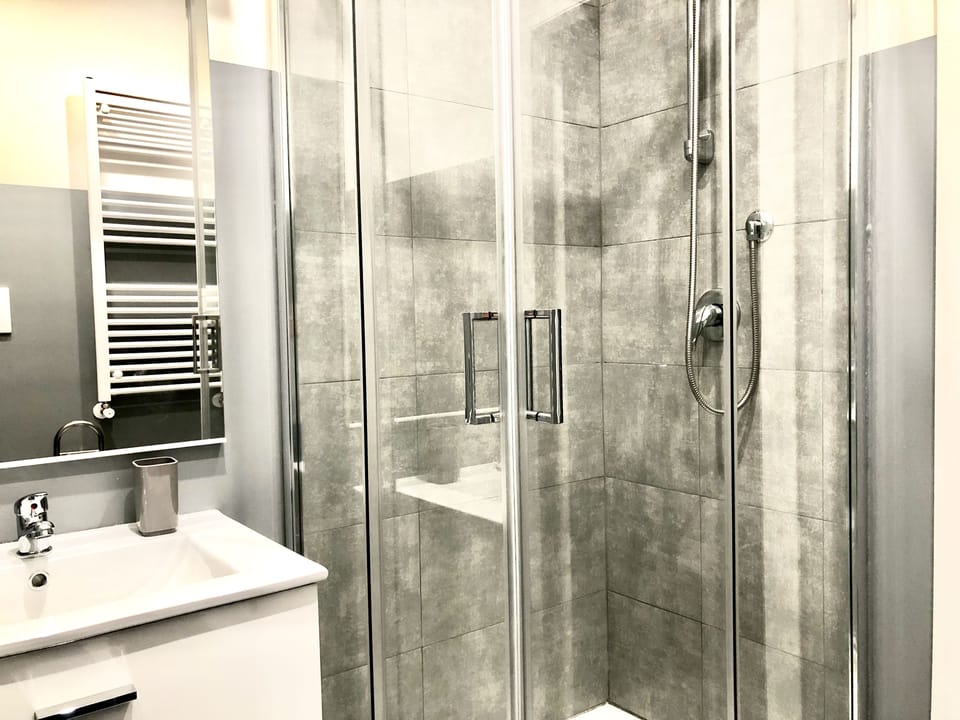Standard Double Room, Balcony | Bathroom | Shower, free toiletries, hair dryer, towels