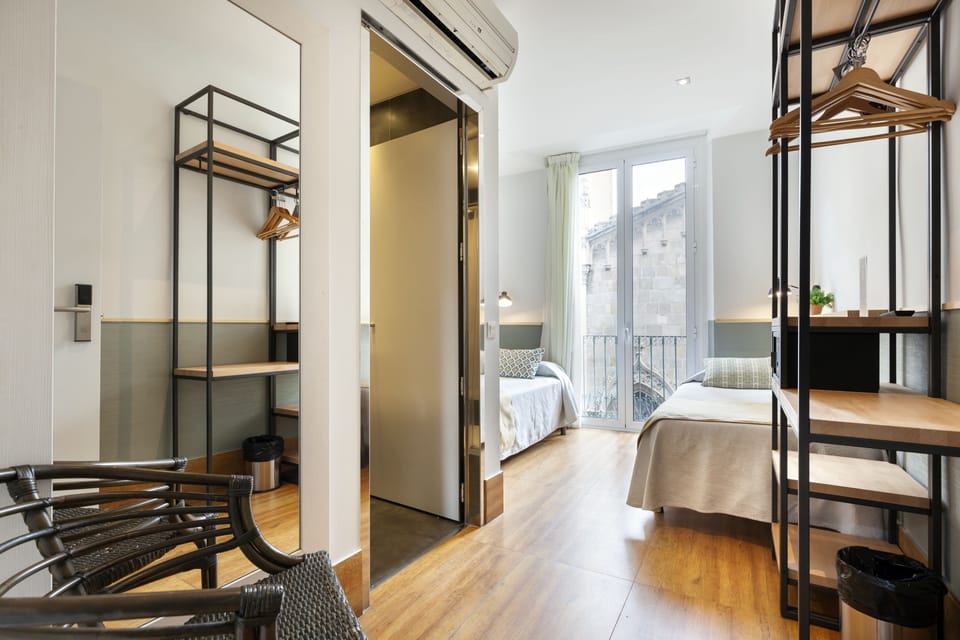 Economy Twin Room, 2 Twin Beds | In-room safe, desk, iron/ironing board, free cribs/infant beds
