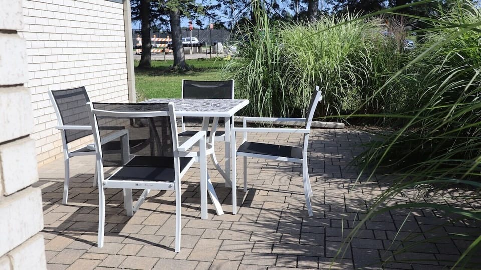 Pavered patio with table and chairs