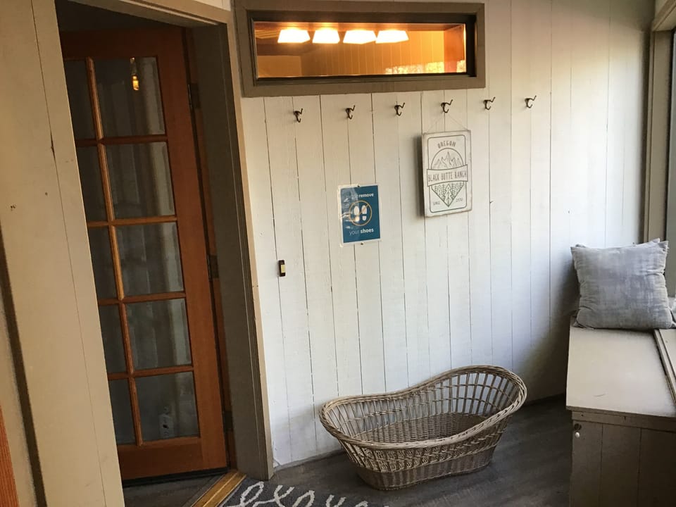 Front entry space for shoes, coats.