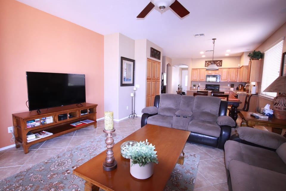 Living room with kitchen in background