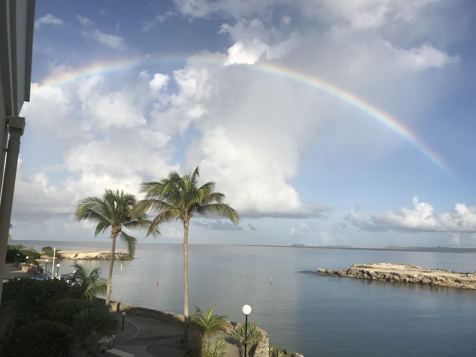 Beautiful rainbow from the front balcony after short rain shower.  Just gorgeous