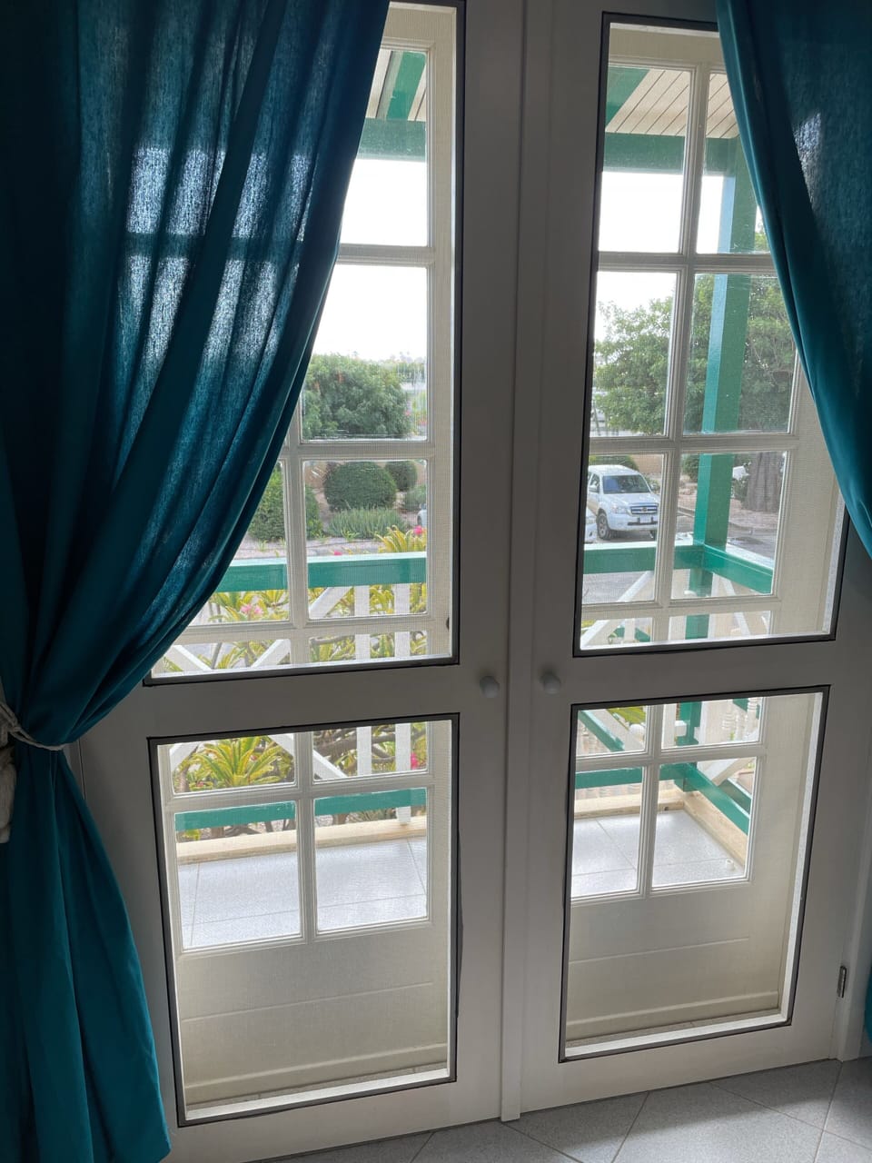 3rd balcony off of bedroom -screened doors to allow gentle breeze through 