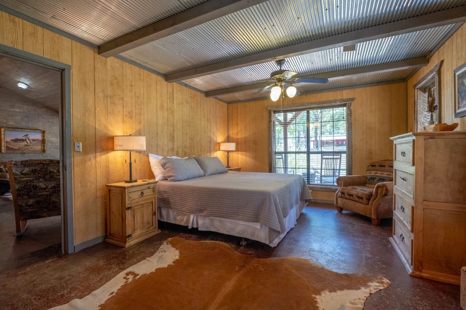 King bed in the master has a sumptuous foam mattress and crisp, white linens.