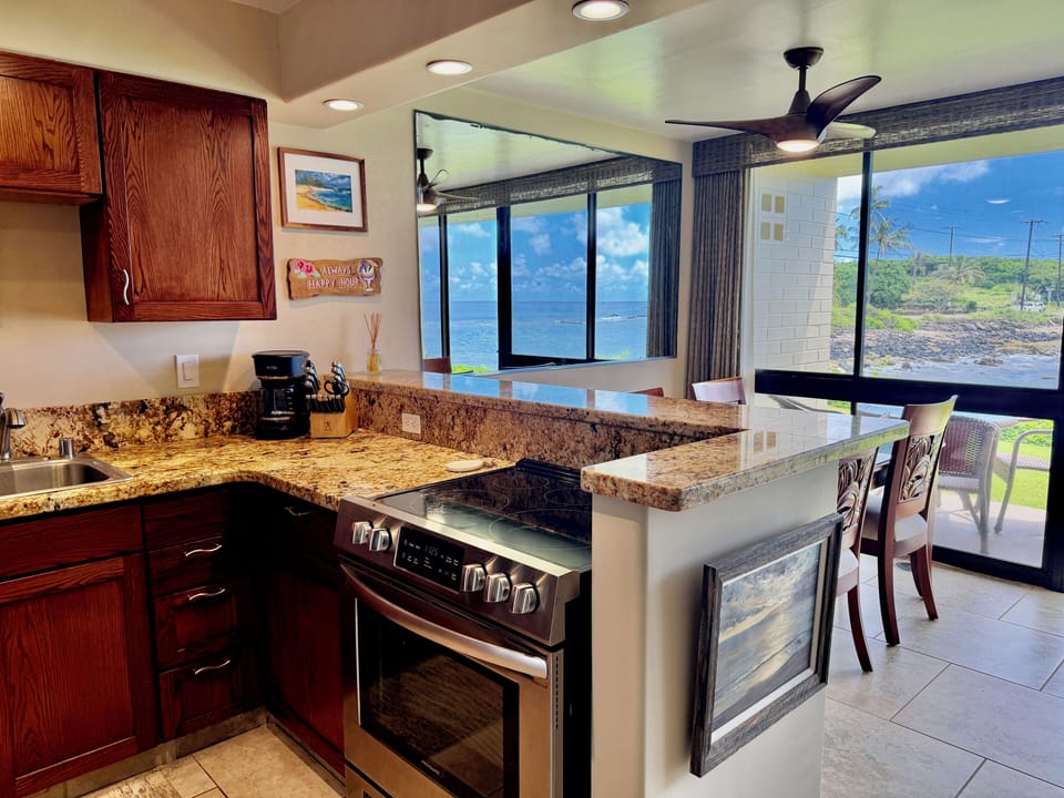 The view from the newly renovated kitchen is spectacular - the ocean calls!