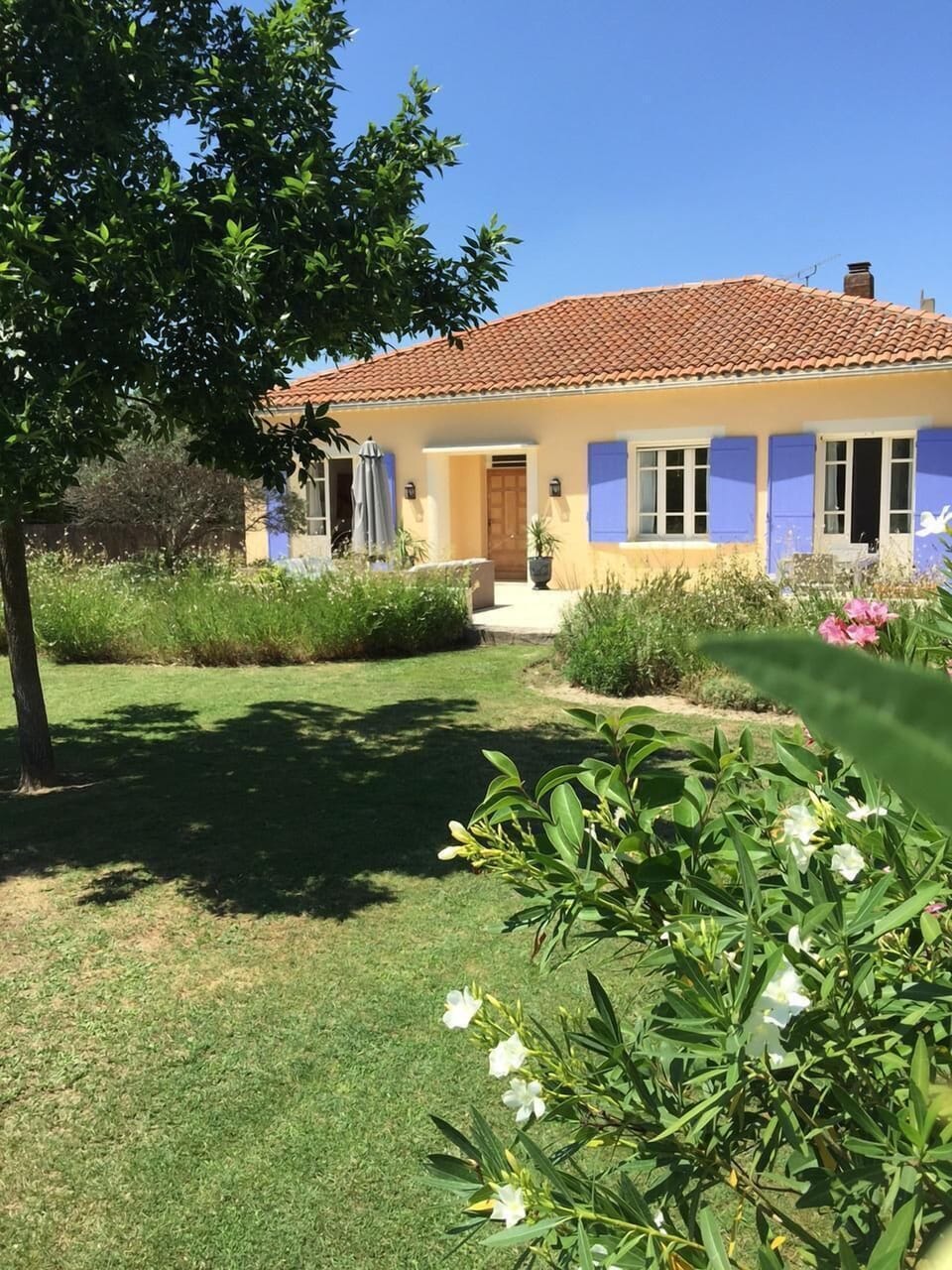 This property is unique in that it has a large pool, terrace and yard - in town!