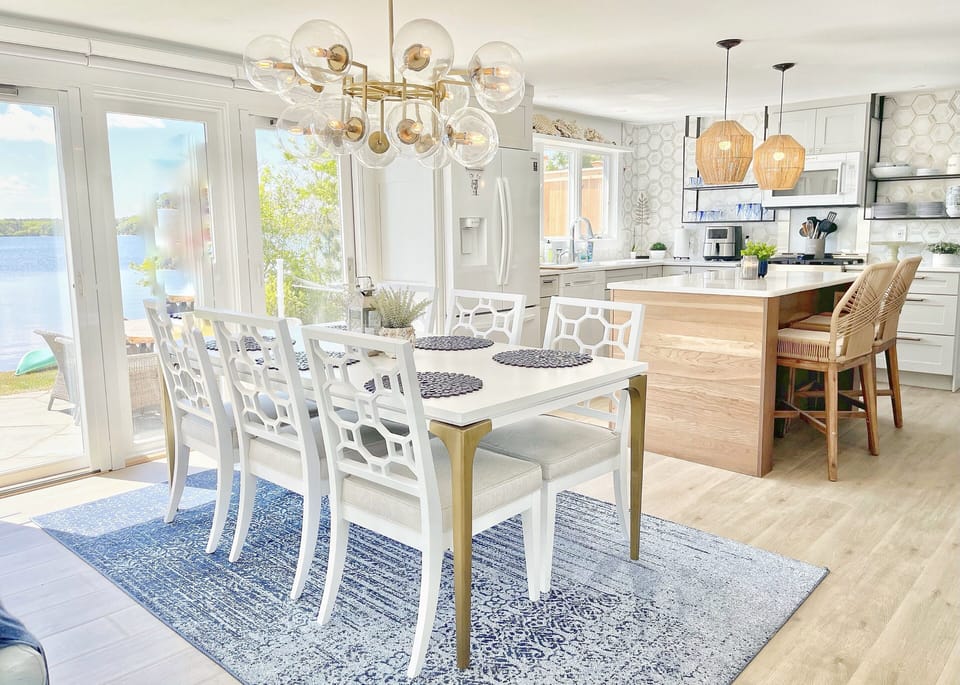 Open floor plan with Williams-Sonoma lighting fixtures & comfortable seating. 