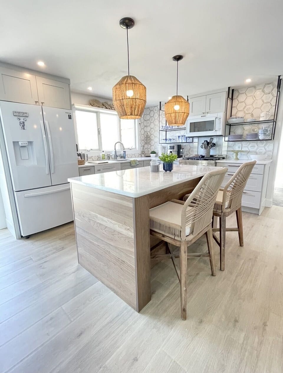Marble counters, KitchenAid appliances & gas stove. All overlooking the water. 