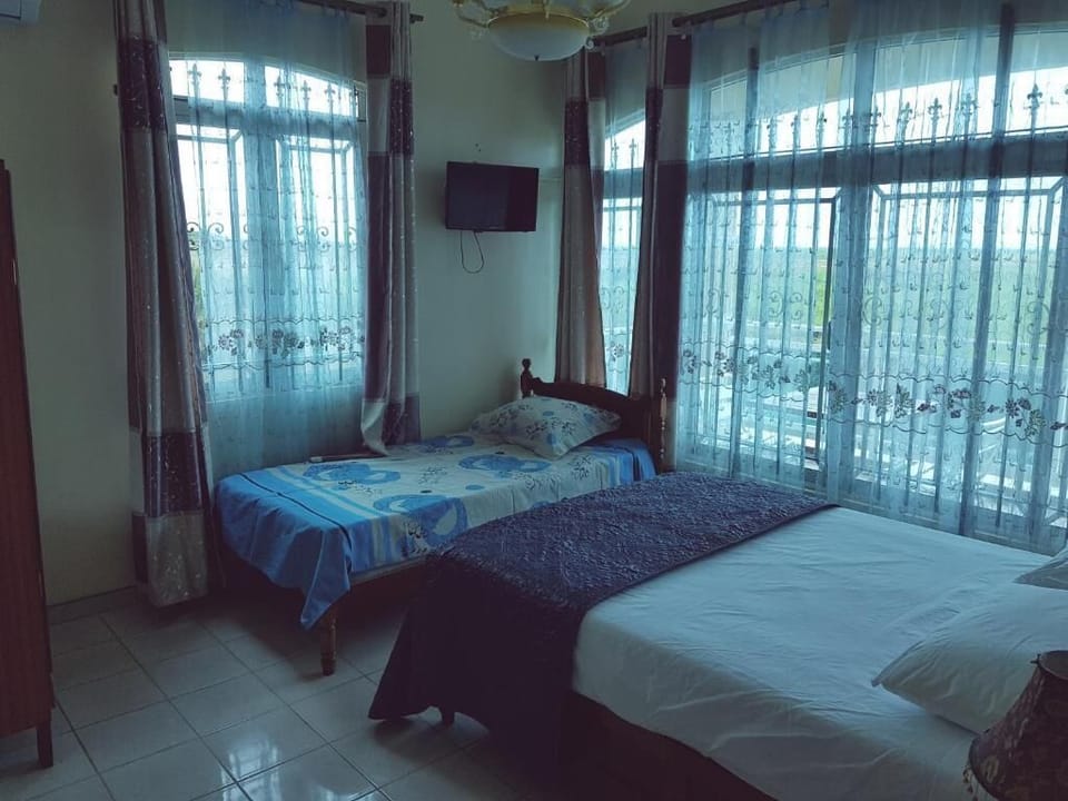 Standard Room, 1 Double Bed | Laptop workspace, iron/ironing board (on request), bed sheets