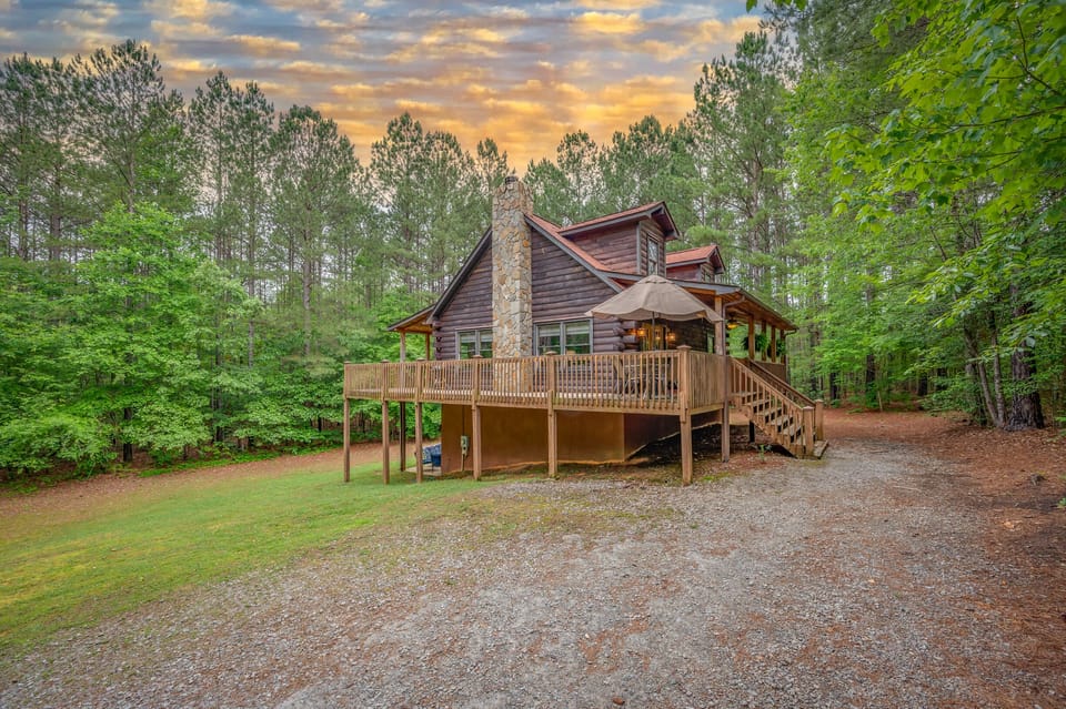 Large 3 story log cabin with wrap around , fully enclosed deck and hot tub. 
