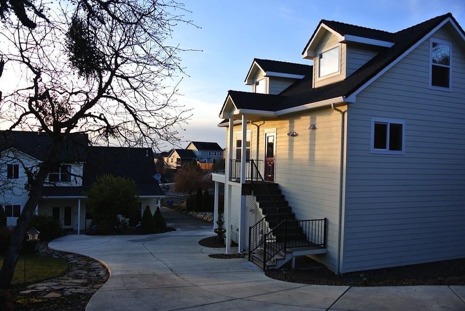 Rear corner of Carriage House, near parking area. (owner's house can be seen)