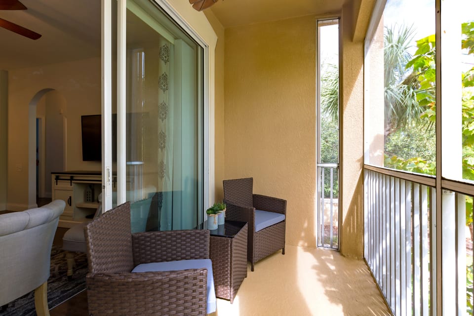 Screened in Patio with comfortable seating -  just off the living area.