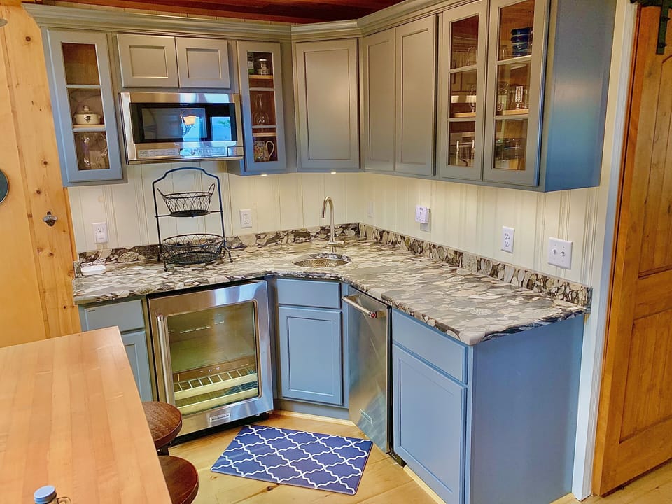 Wet bar with beverage fridge and ice maker