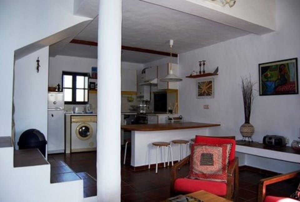Eating counter and kitchen seen from living room